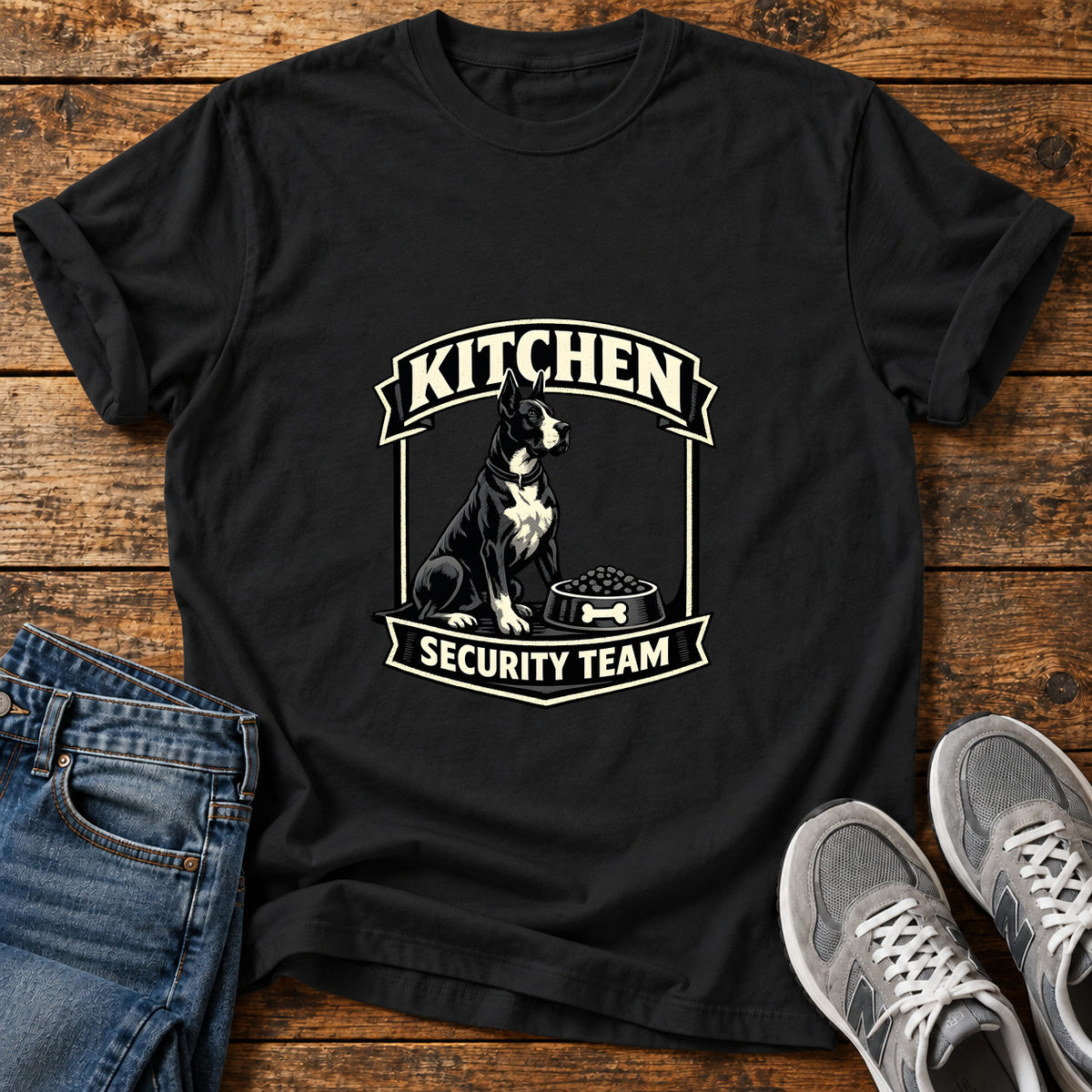 Kitchen Security Great Dane graphic T-shirt in Black, shown on a flat-lay shirt mockup