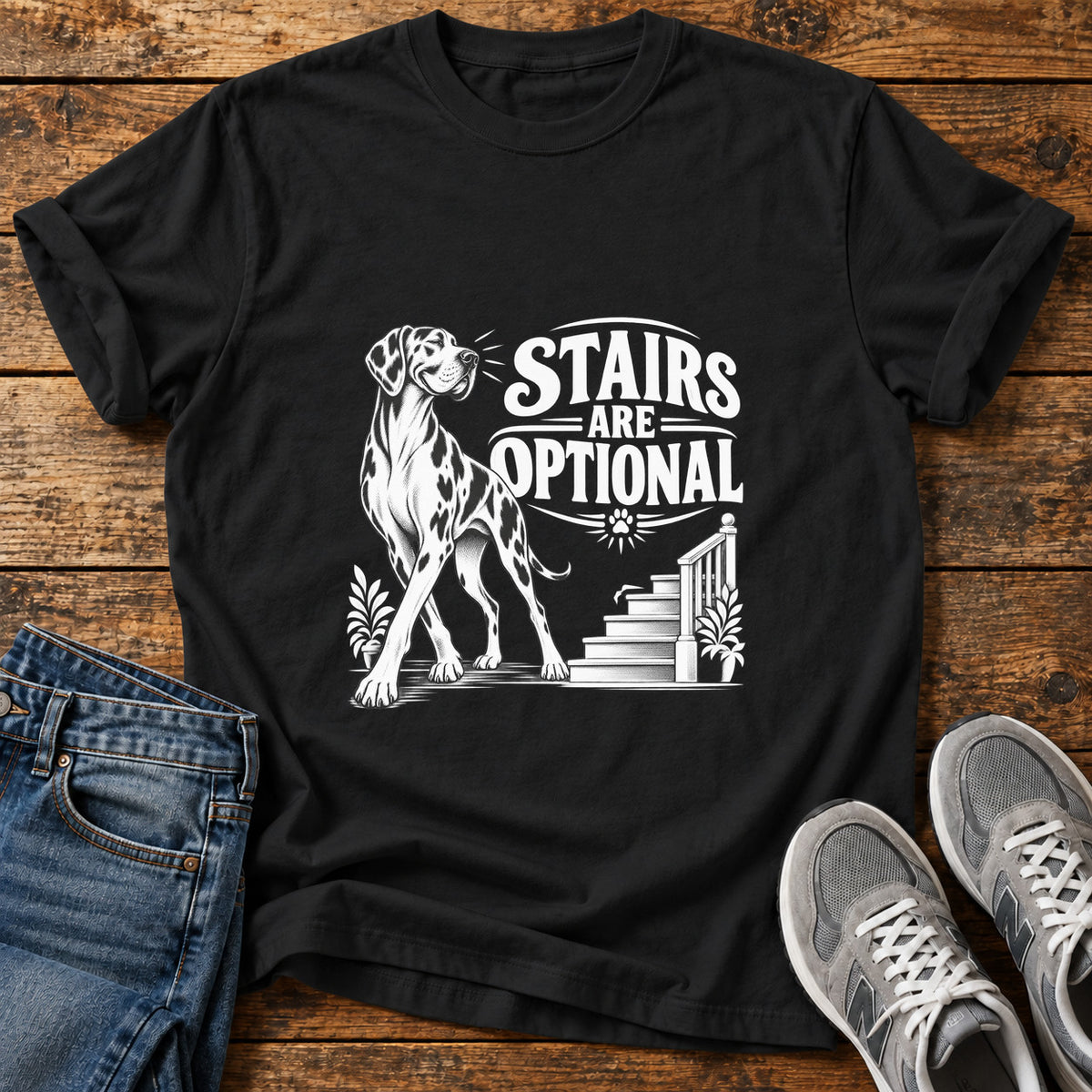 Stairs Optional Great Dane graphic T-shirt in Black, shown on a flat-lay shirt mockup