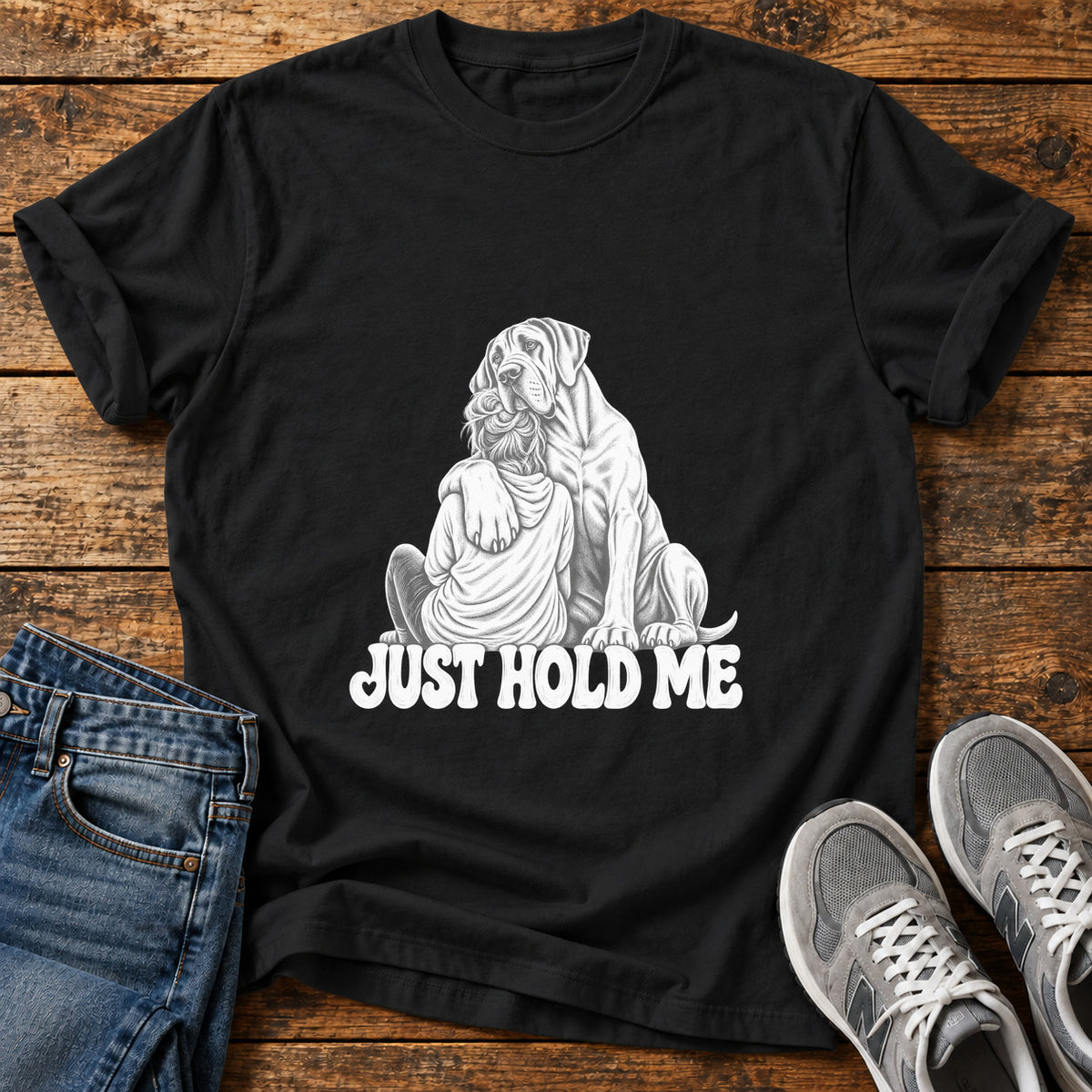 Just Hold Me Great Dane graphic T-shirt in Black, shown on a flat-lay shirt mockup