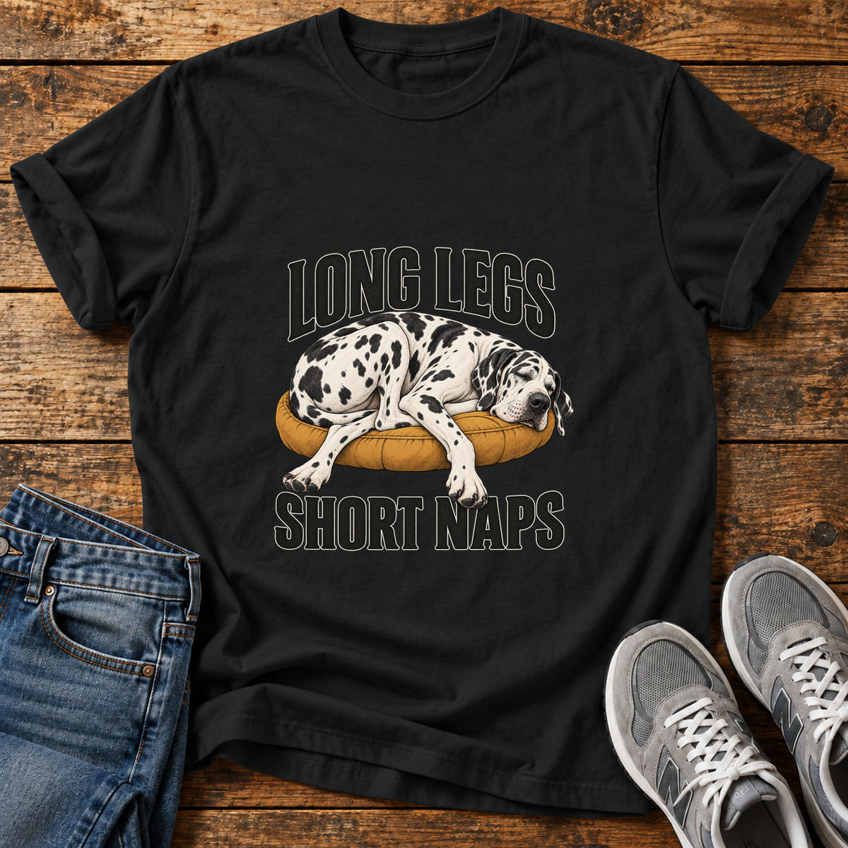 Long Legs Naps Great Dane graphic T-shirt in Black, shown on a flat-lay shirt mockup