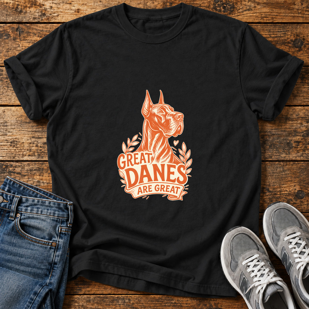 Great Danes Great graphic T-shirt in Black, shown on a flat-lay shirt mockup