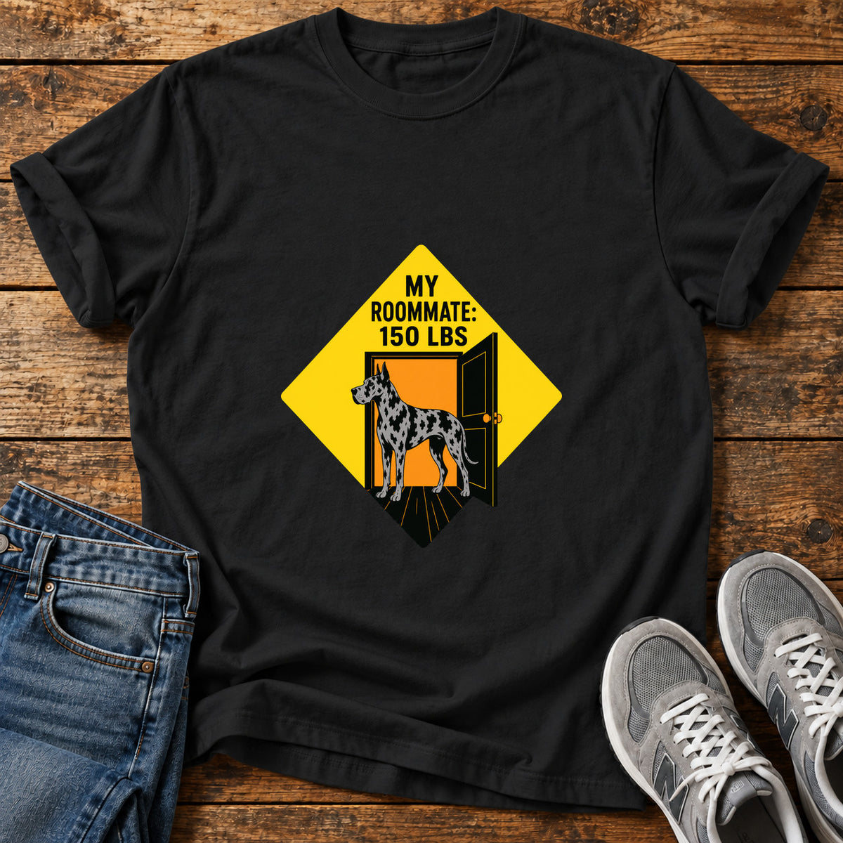 Roommate Dog Great Dane graphic T-shirt in Black, shown on a flat-lay shirt mockup