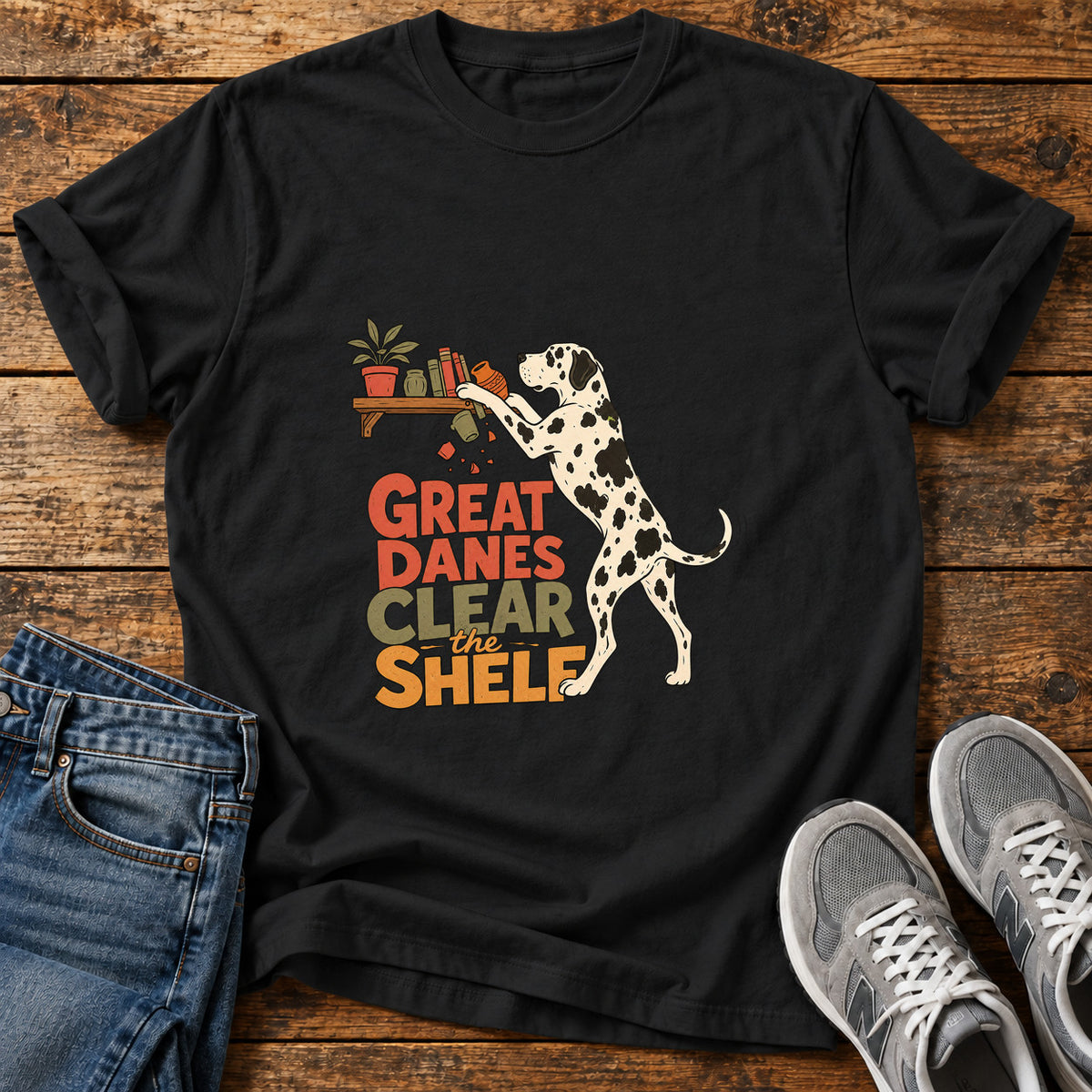 Great Danes Shelf graphic T-shirt in Black, shown on a flat-lay shirt mockup