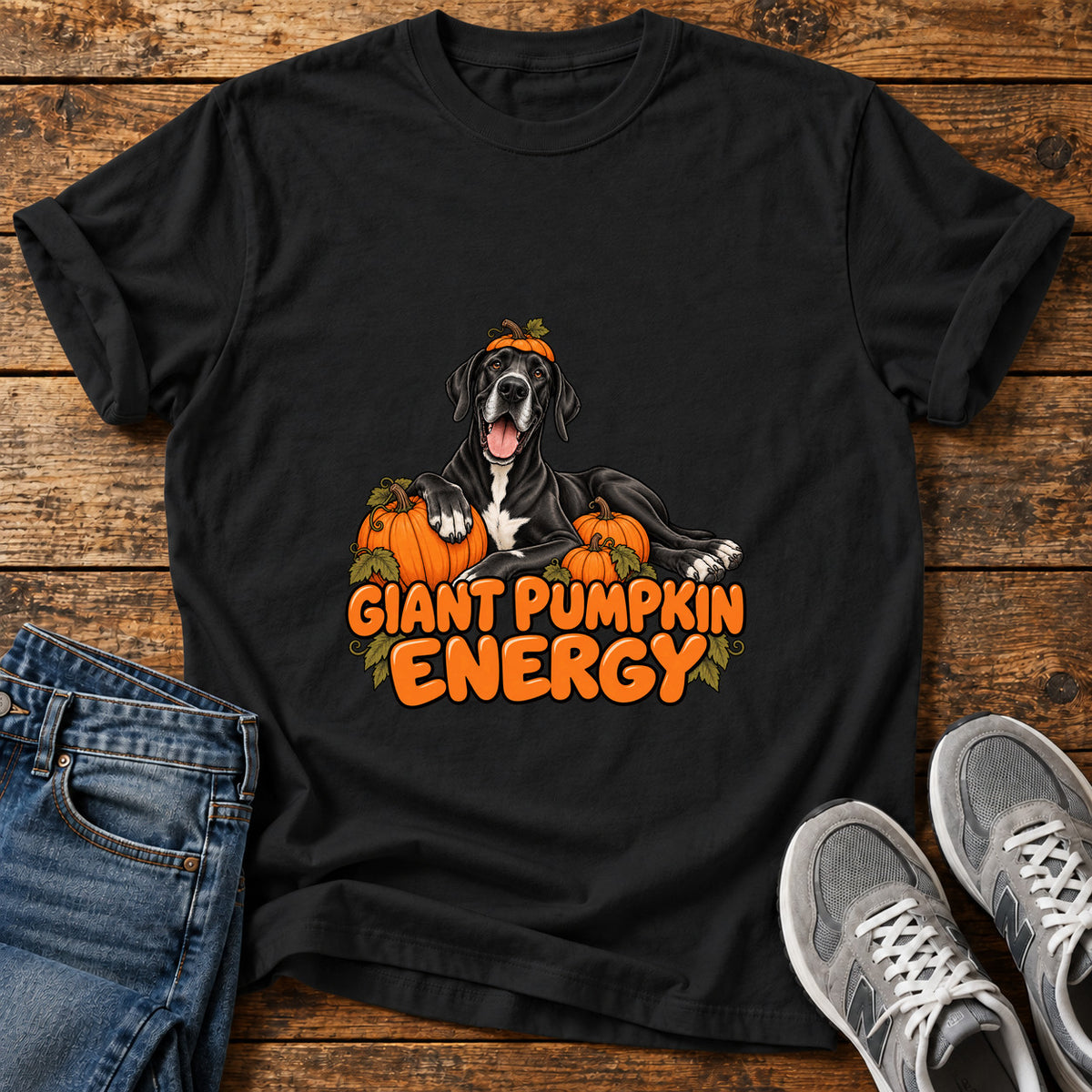 Giant Pumpkin Energy Great Dane graphic T-shirt in Black, shown on a flat-lay shirt mockup