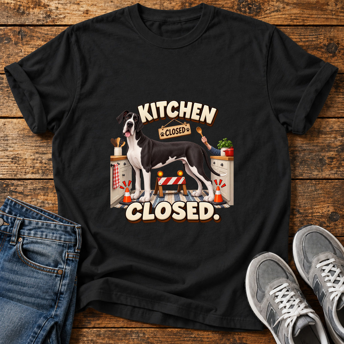 Kitchen Closed Great Dane graphic T-shirt in Black, shown on a flat-lay shirt mockup