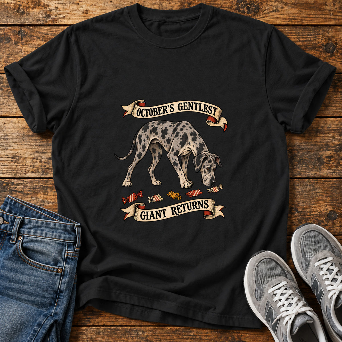 October's Gentlest Great Dane graphic T-shirt in Black, shown on a flat-lay shirt mockup