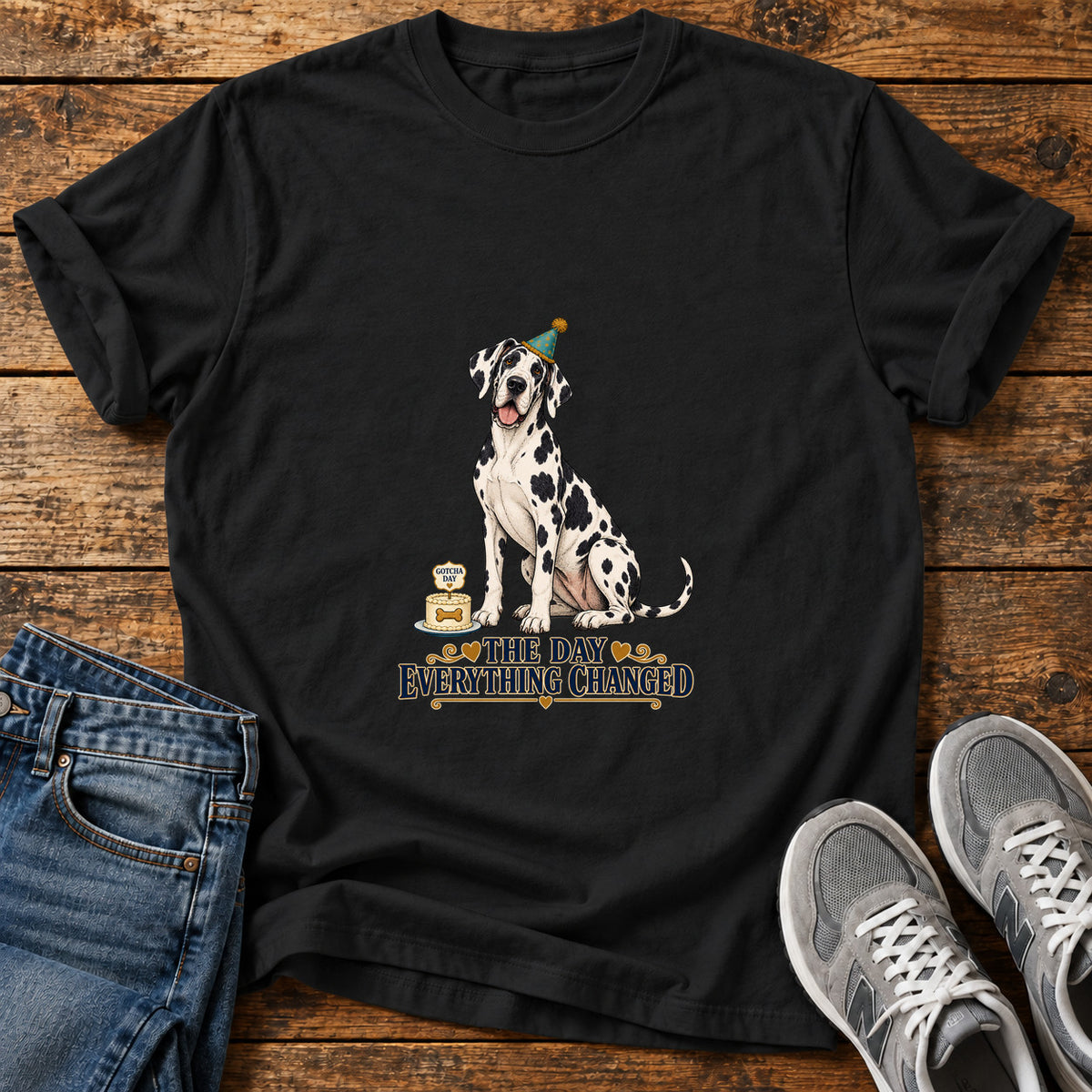 The Day Changed Great Dane graphic T-shirt in Black, shown on a flat-lay shirt mockup