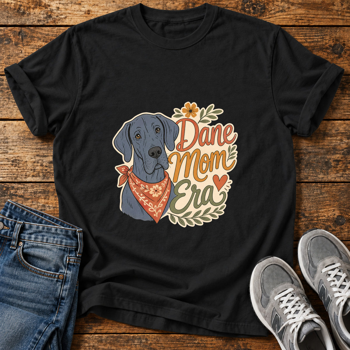 Dane Mom Era Great Dane graphic T-shirt in Black, shown on a flat-lay shirt mockup
