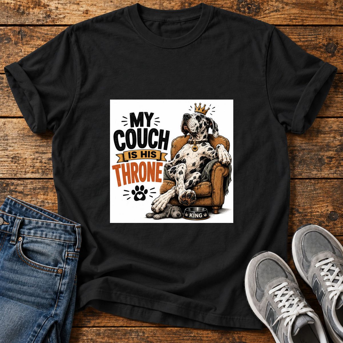 Couch Throne Great Dane graphic T-shirt in Black, shown on a flat-lay shirt mockup