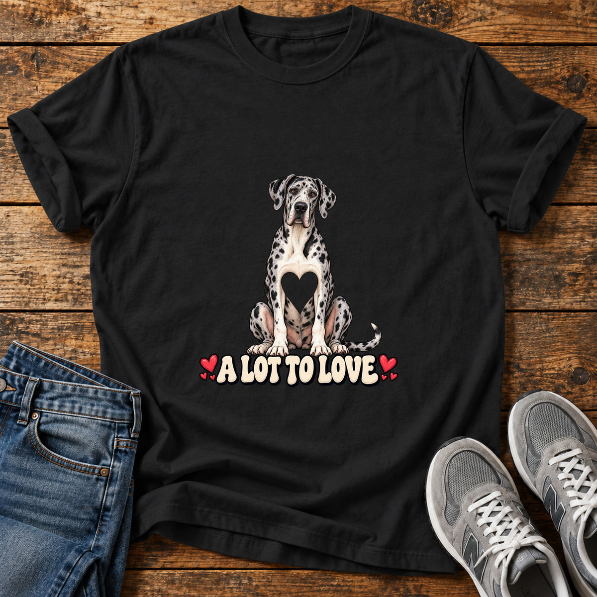 A Lot To Great Dane graphic T-shirt in Black, shown on a flat-lay shirt mockup