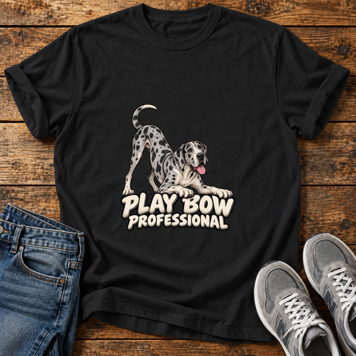Play Bow Pro Great Dane graphic T-shirt in Black, shown on a flat-lay shirt mockup