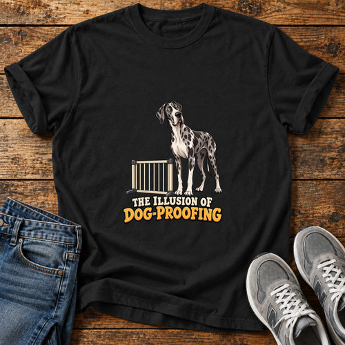 Dog Proofing Illusion Great Dane graphic T-shirt in Black, shown on a flat-lay shirt mockup