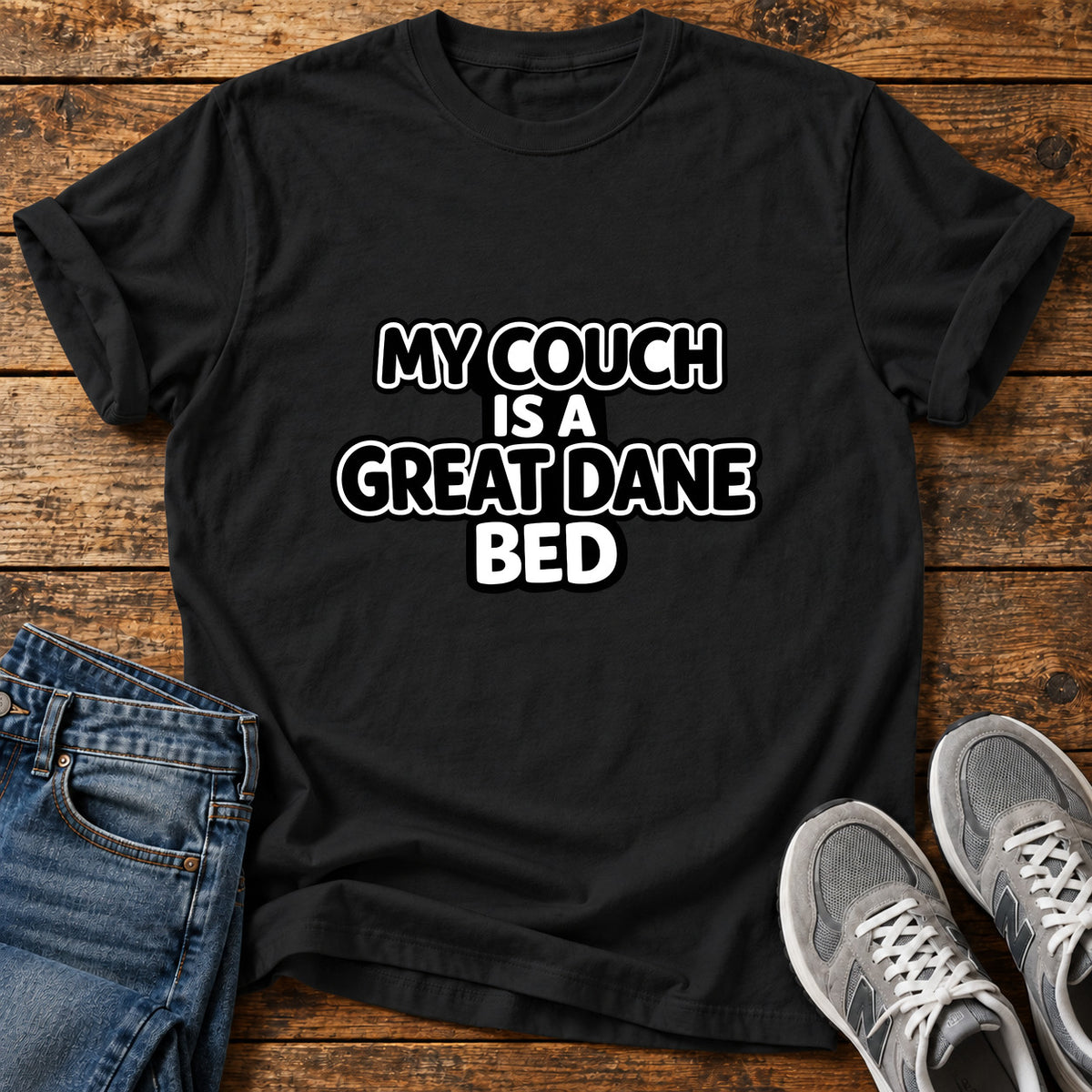 Great Dane Bed graphic T-shirt in Black, shown on a flat-lay shirt mockup