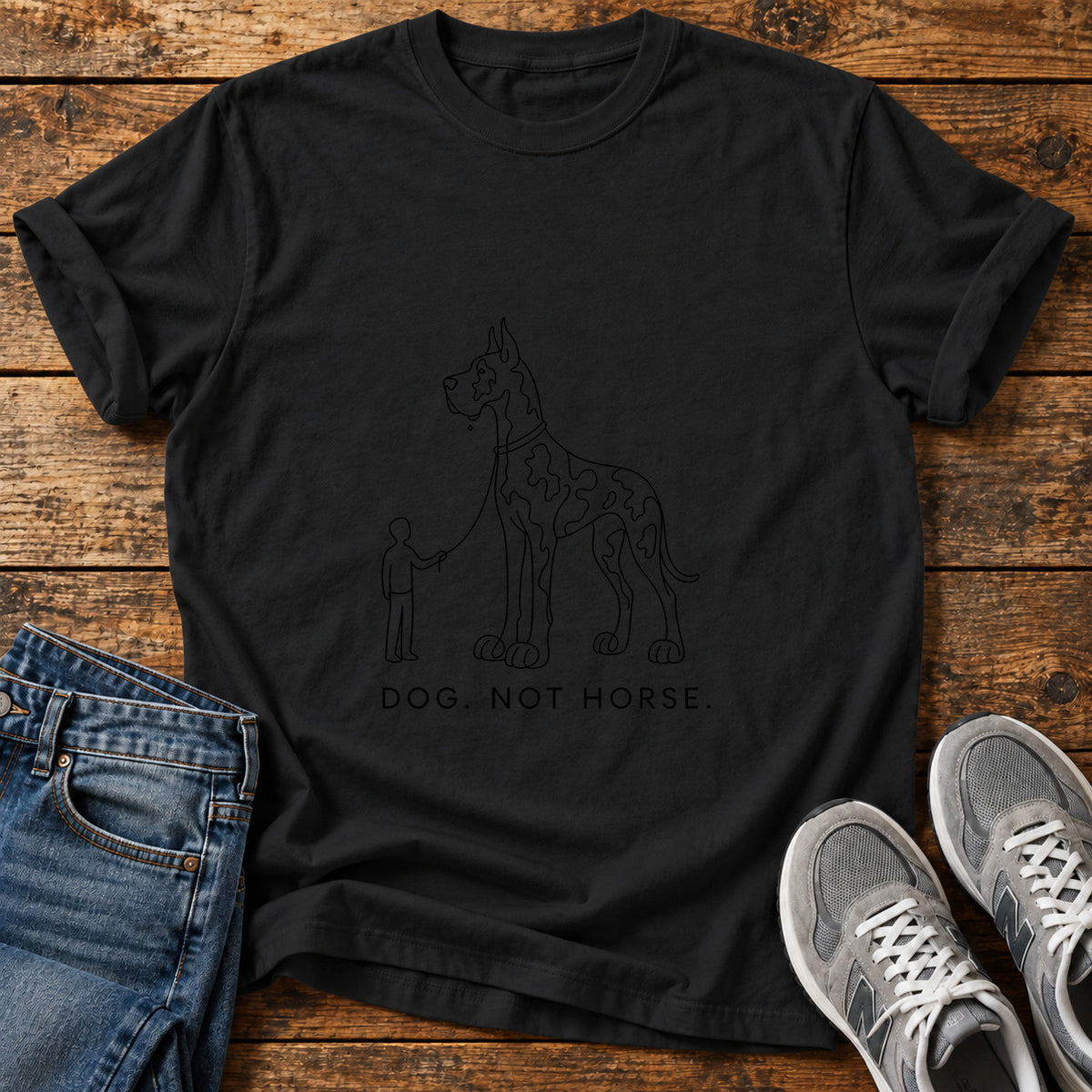 Dog Not Horse Great Dane graphic T-shirt in Black, shown on a flat-lay shirt mockup