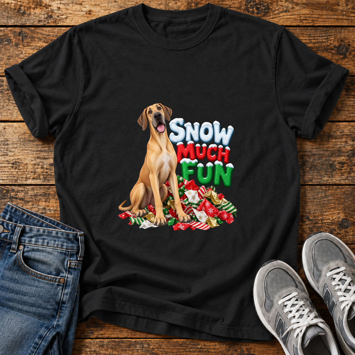 Snow Much Fun Great Dane graphic T-shirt in Black, shown on a flat-lay shirt mockup
