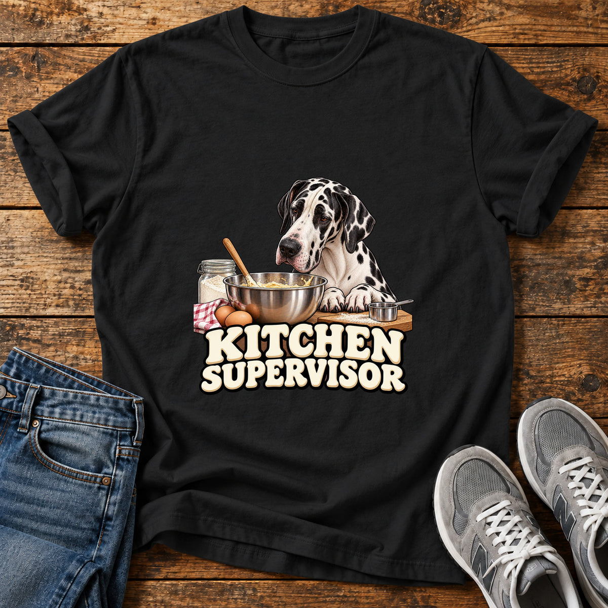 Kitchen Supervisor Great Dane graphic T-shirt in Black, shown on a flat-lay shirt mockup