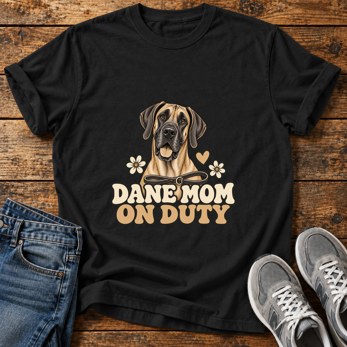 Dane Mom Duty Great Dane graphic T-shirt in Black, shown on a flat-lay shirt mockup