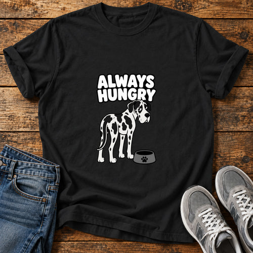 Always Hungry Great Dane graphic T-shirt in Black, shown on a flat-lay shirt mockup