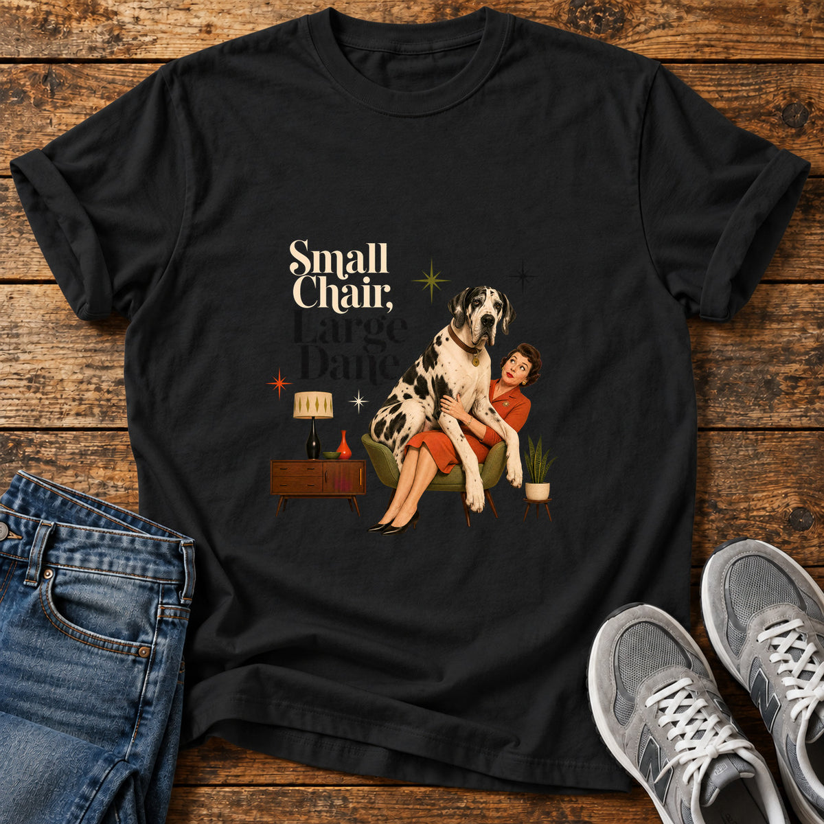 Small Chair Great Dane graphic T-shirt in Black, shown on a flat-lay shirt mockup