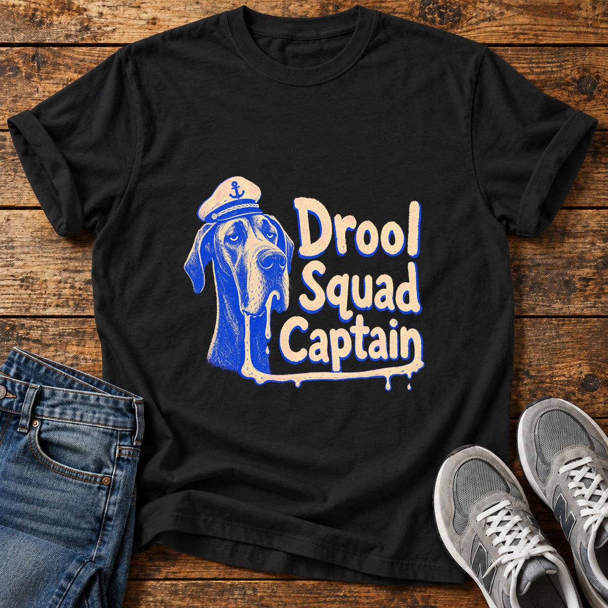 Drool Squad Captain Great Dane graphic T-shirt in Black, shown on a flat-lay shirt mockup
