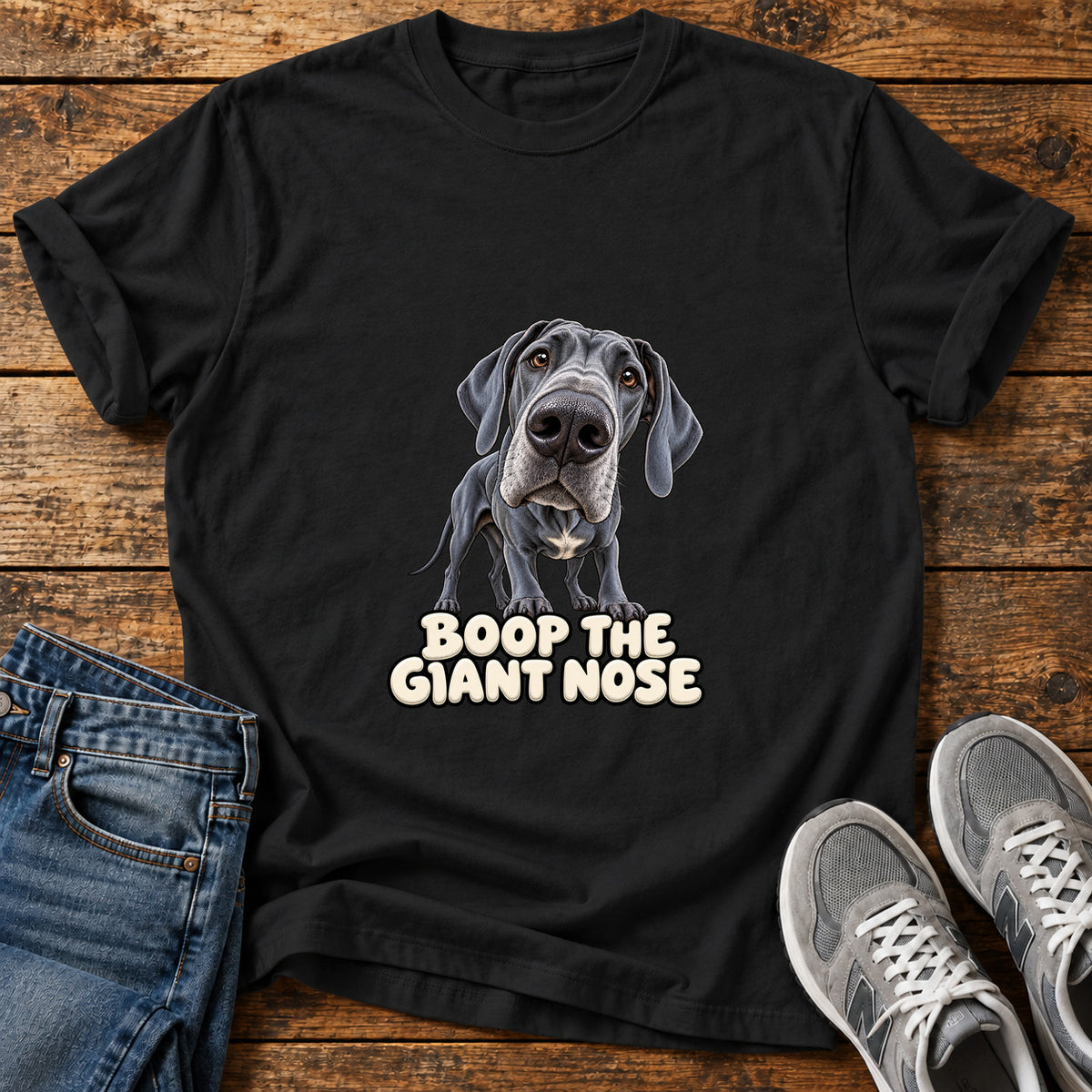 Boop Giant Nose Great Dane graphic T-shirt in Black, shown on a flat-lay shirt mockup