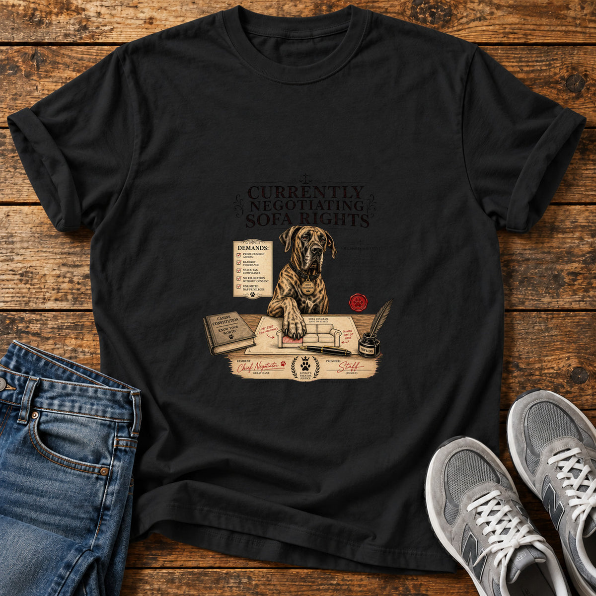 Sofa Rights Negotiation Great Dane graphic T-shirt in Black, shown on a flat-lay shirt mockup