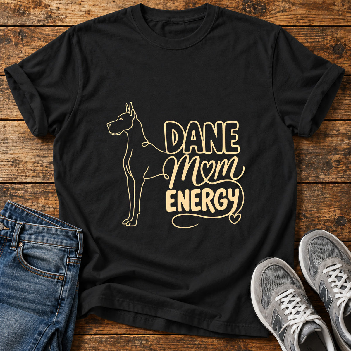 Dane Mom Vibes Great Dane graphic T-shirt in Black, shown on a flat-lay shirt mockup