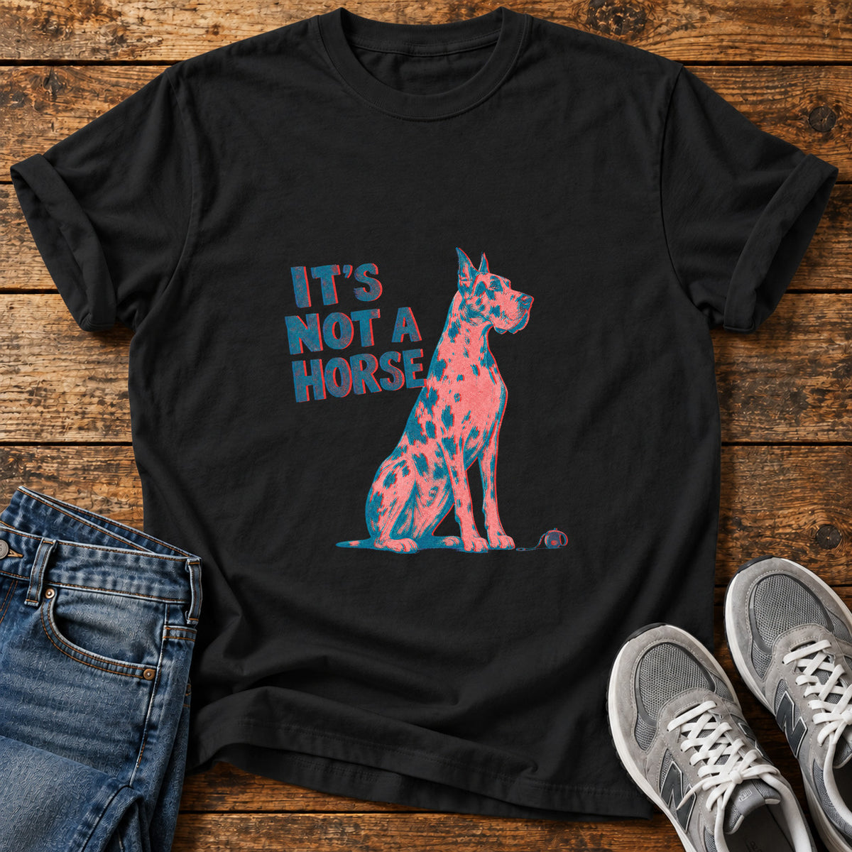 It's Not A Great Dane graphic T-shirt in Black, shown on a flat-lay shirt mockup