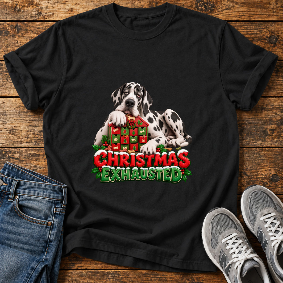 Christmas Exhausted Great Dane graphic T-shirt in Black, shown on a flat-lay shirt mockup
