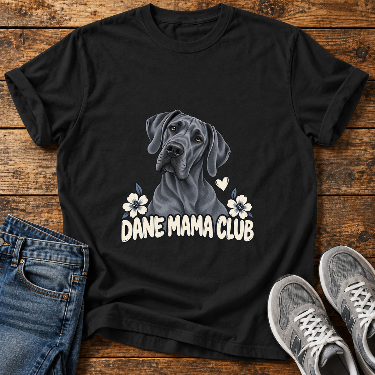 Dane Mama Club Great Dane graphic T-shirt in Black, shown on a flat-lay shirt mockup