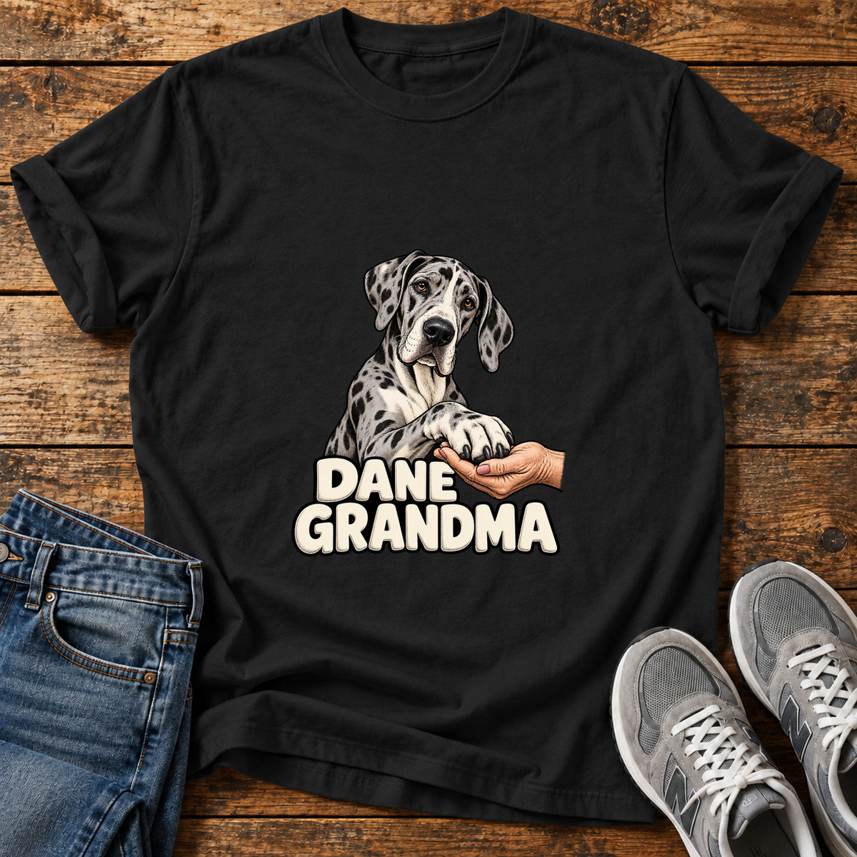 Dane Grandma Great Dane graphic T-shirt in Black, shown on a flat-lay shirt mockup