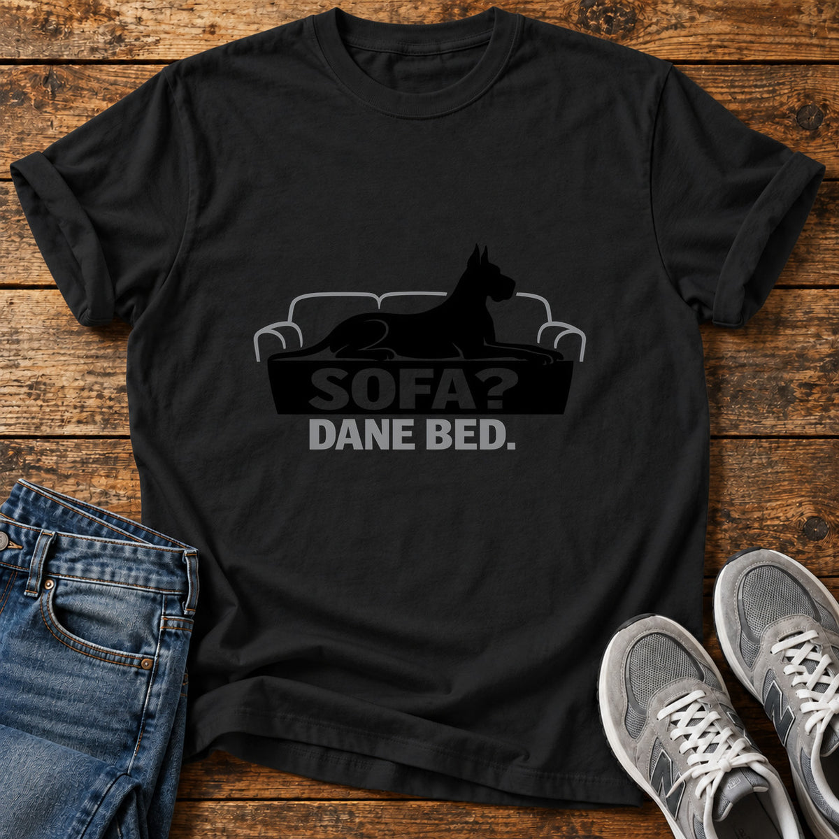 Sofa Dane Bed Great Dane graphic T-shirt in Black, shown on a flat-lay shirt mockup