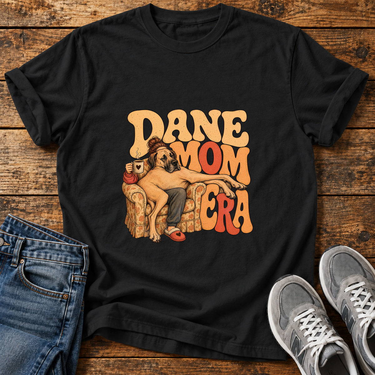 Dane Mom Era Great Dane graphic T-shirt in Black, shown on a flat-lay shirt mockup