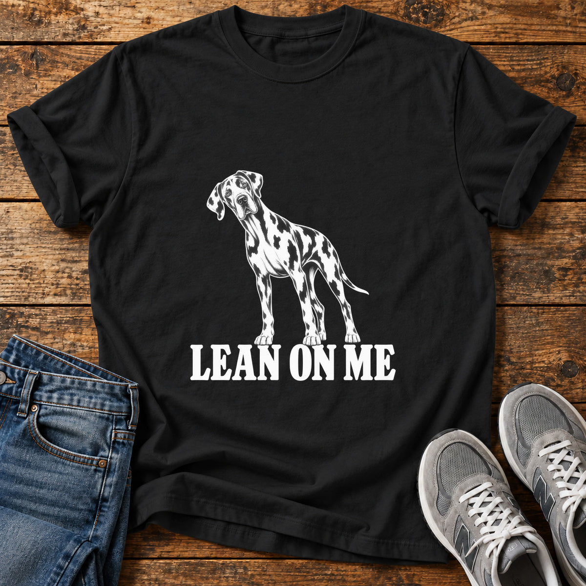 Lean On Me Great Dane graphic T-shirt in Black, shown on a flat-lay shirt mockup