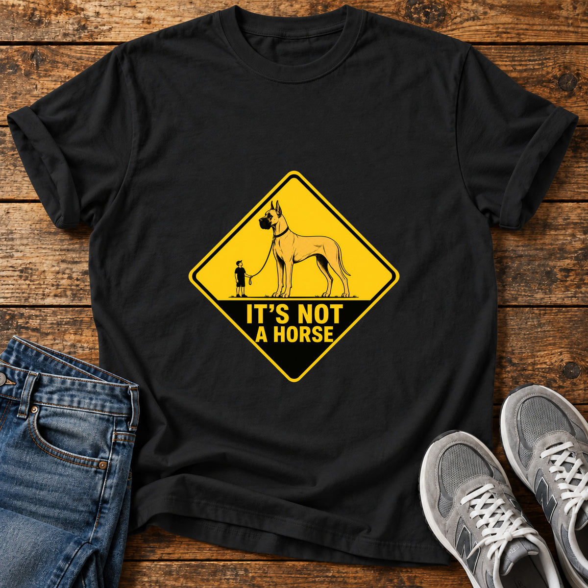 It's Not Horse Great Dane graphic T-shirt in Black, shown on a flat-lay shirt mockup