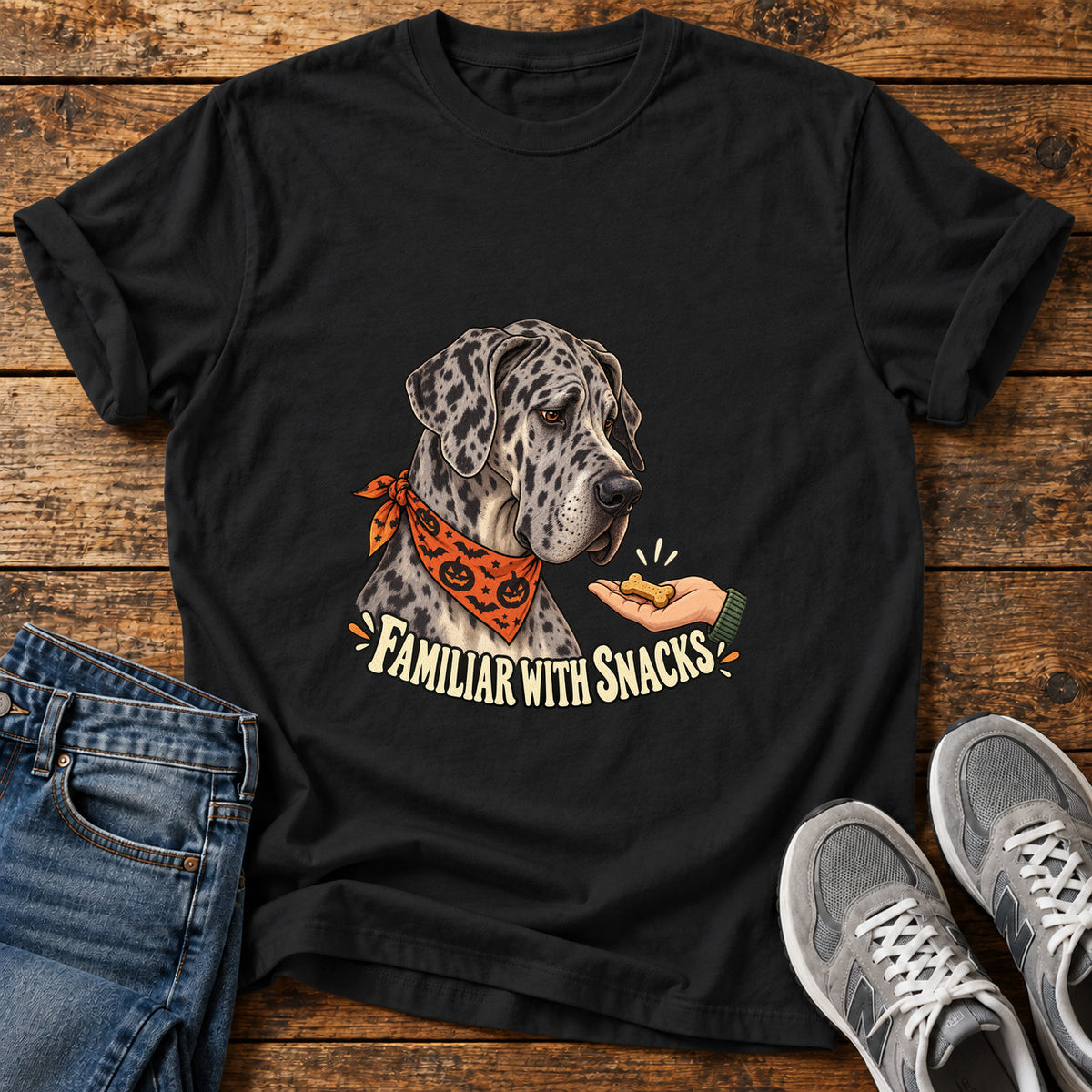Familiar Snacks Great Dane graphic T-shirt in Black, shown on a flat-lay shirt mockup