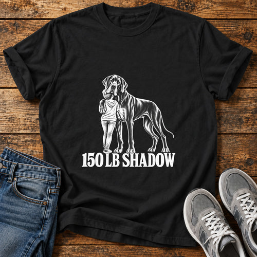 150 LB Shadow Great Dane graphic T-shirt in Black, shown on a flat-lay shirt mockup