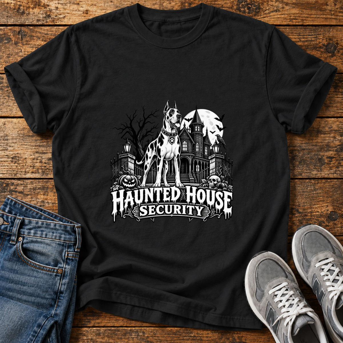 Haunted House Security Great Dane graphic T-shirt in Black, shown on a flat-lay shirt mockup