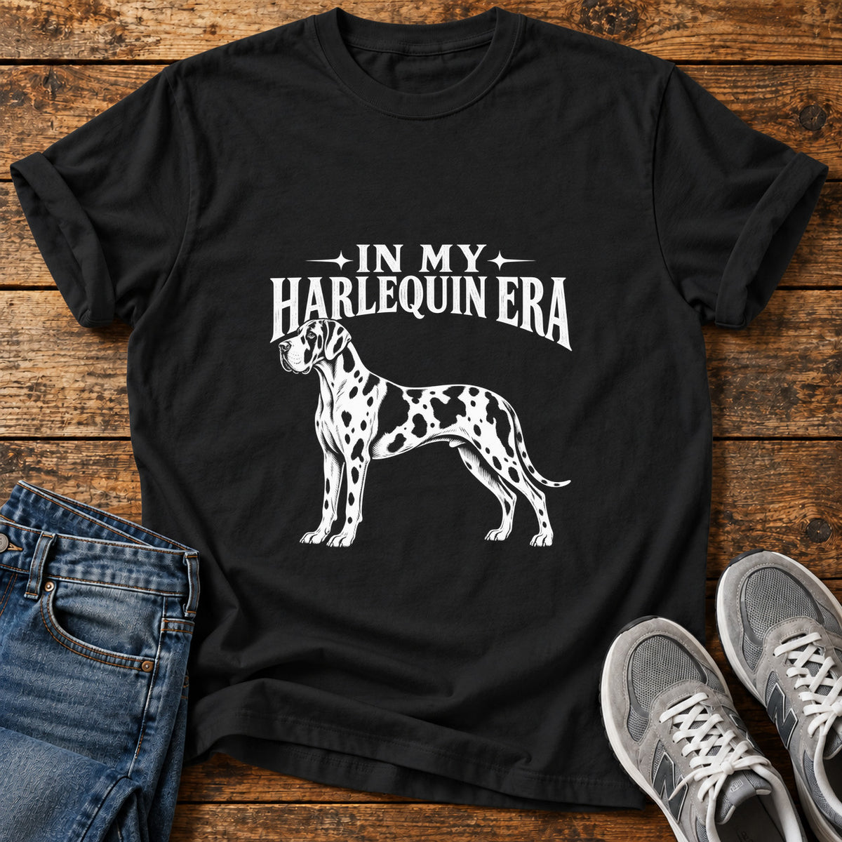 Harlequin Era Great Dane graphic T-shirt in Black, shown on a flat-lay shirt mockup
