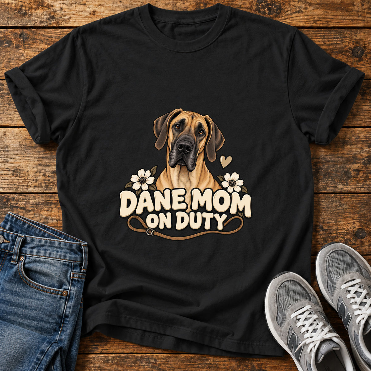 Dane Mom Duty Great Dane graphic T-shirt in Black, shown on a flat-lay shirt mockup