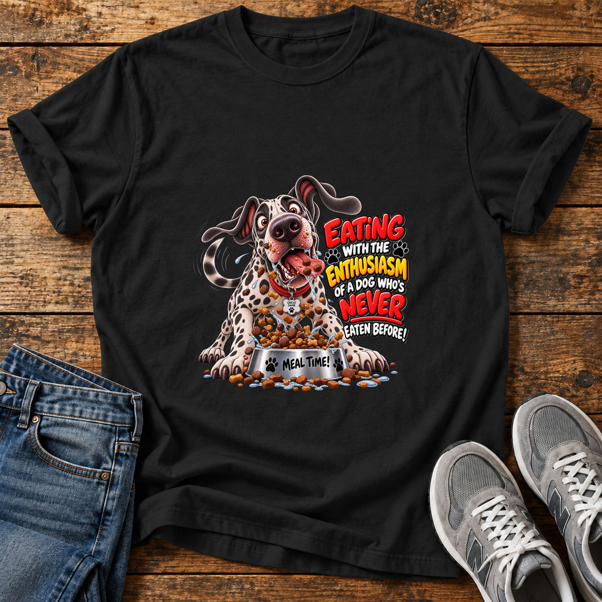 Eating Enthusiasm Great Dane graphic T-shirt in Black, shown on a flat-lay shirt mockup