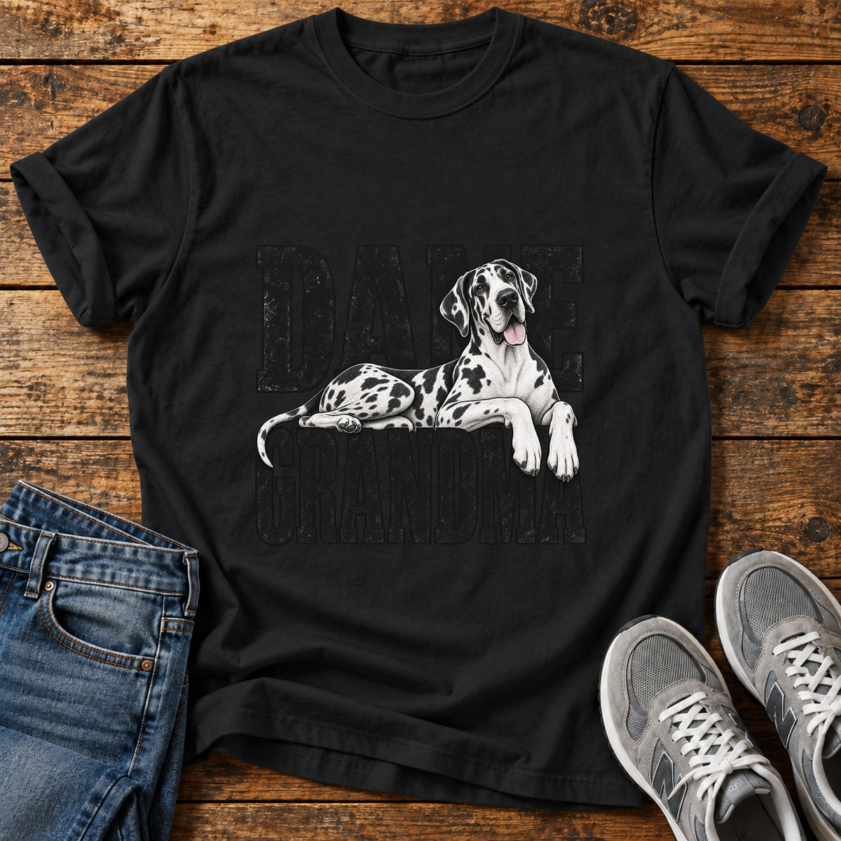 Dane Grandma Great Dane graphic T-shirt in Black, shown on a flat-lay shirt mockup