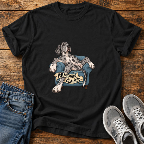 Armchair Claimed Great Dane graphic T-shirt in Black, shown on a flat-lay shirt mockup