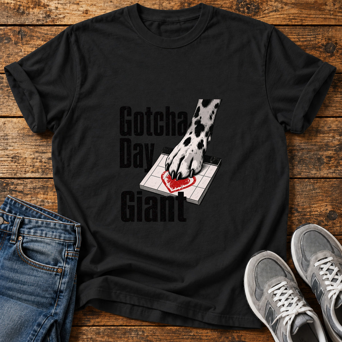 Gotcha Day Giant Great Dane graphic T-shirt in Black, shown on a flat-lay shirt mockup