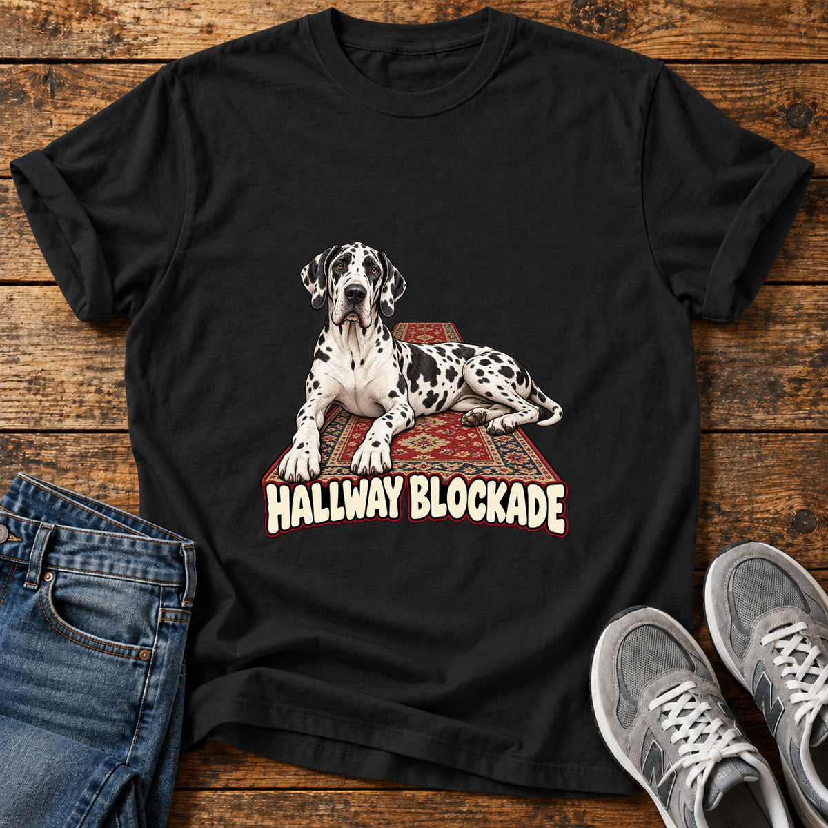 Hallway Blockade Great Dane graphic T-shirt in Black, shown on a flat-lay shirt mockup