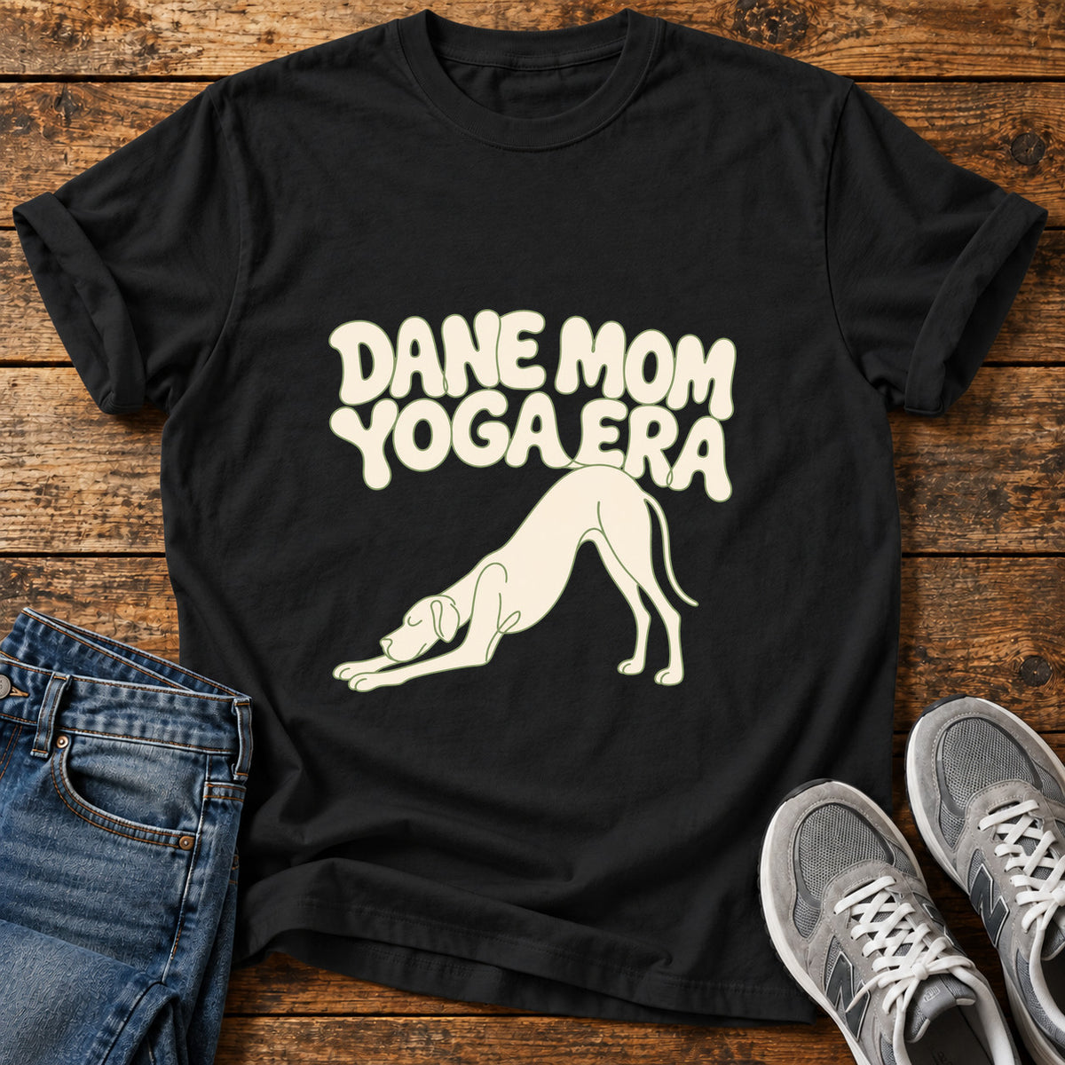 Dane Yoga Era Great Dane graphic T-shirt in Black, shown on a flat-lay shirt mockup