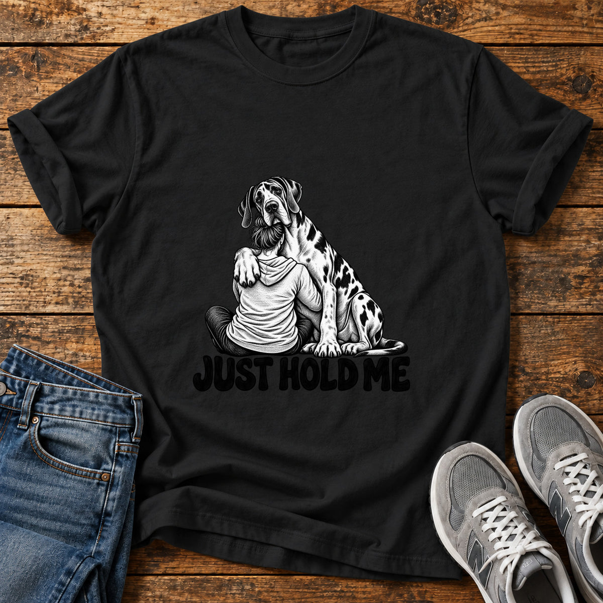 Just Hold Me Great Dane graphic T-shirt in Black, shown on a flat-lay shirt mockup