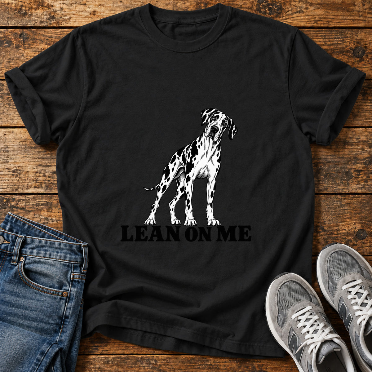 Lean On Me Great Dane graphic T-shirt in Black, shown on a flat-lay shirt mockup