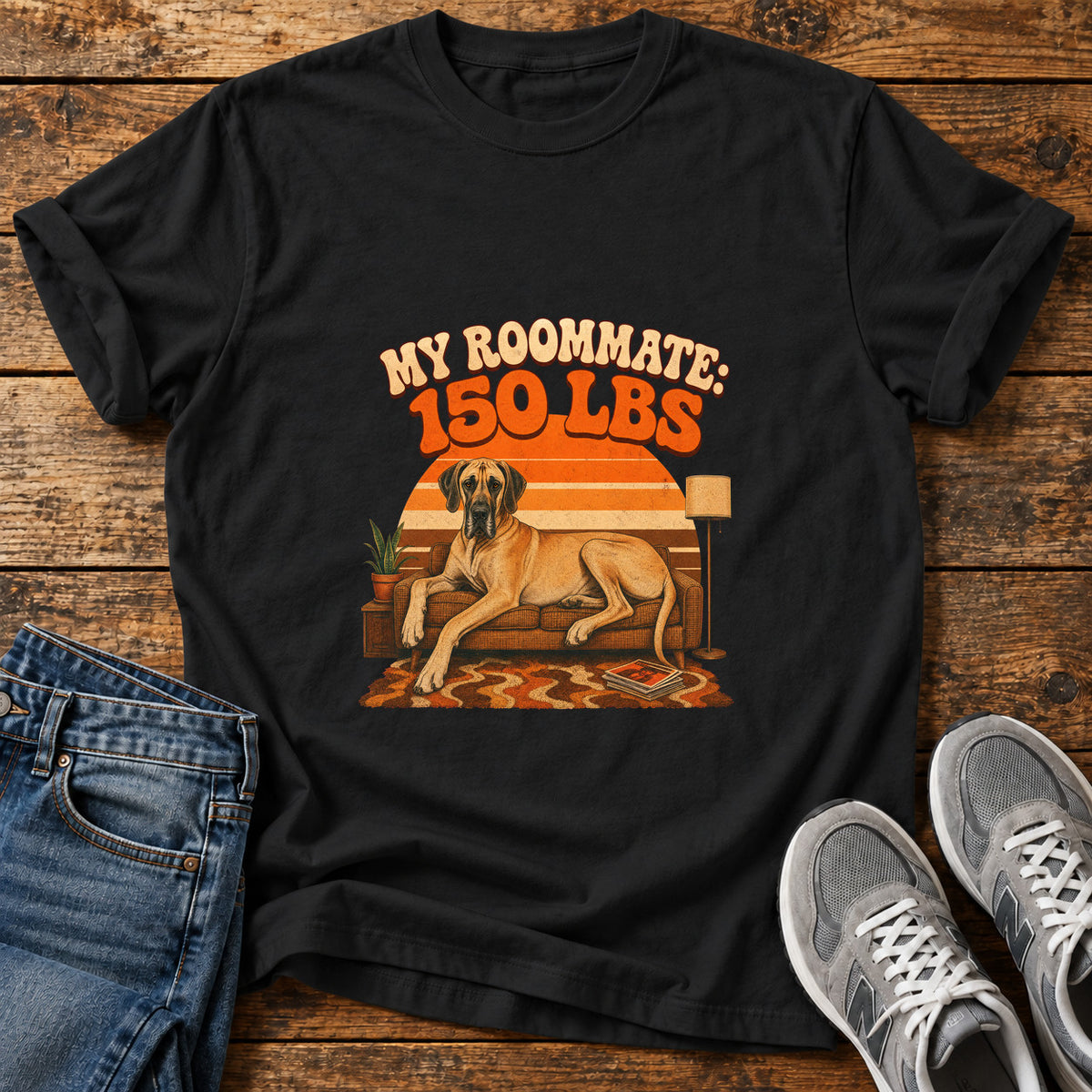 Roommate 150lbs Great Dane graphic T-shirt in Black, shown on a flat-lay shirt mockup