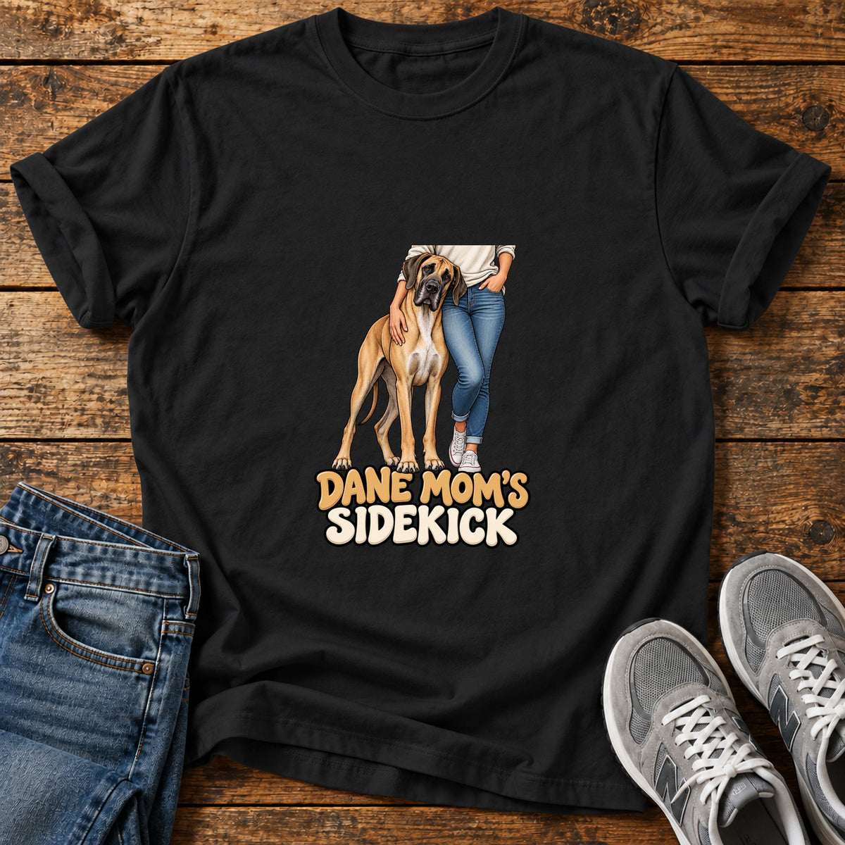 Dane Mom's Sidekick Great Dane graphic T-shirt in Black, shown on a flat-lay shirt mockup